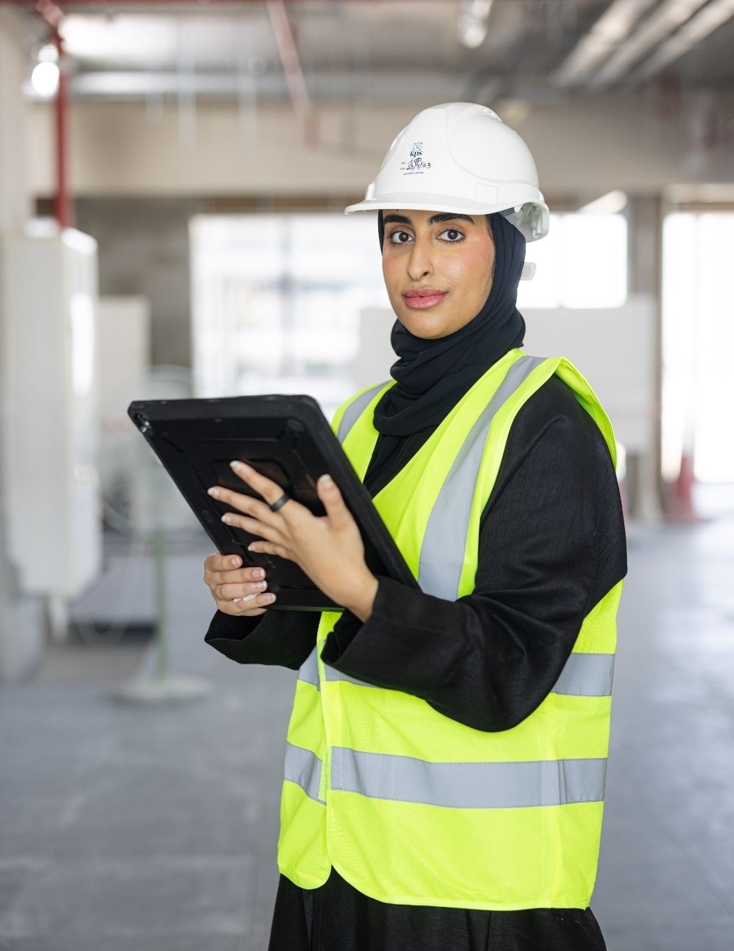 commercial interiors companies uae portrait photo of staff wearing personal protection equipment